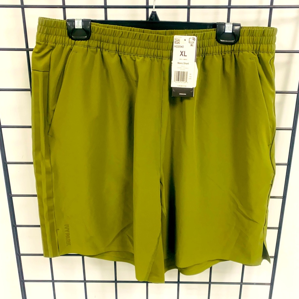 ADIDAS X IVY PARK X PELETON FOCUS OLIVE CRINKLE SHORTS